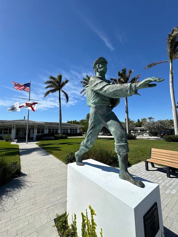 The Barefoot Mailman Statue - Image 1