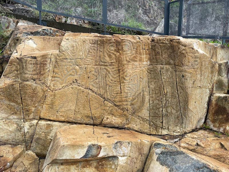 Rock Carving at Big Wave Bay - Image 1