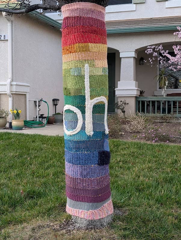Yarnbombed public art: Oh, the Tree with the Rainbow Sweater - Image 1