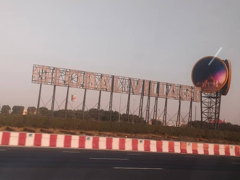 Global Village Sign - Image 1