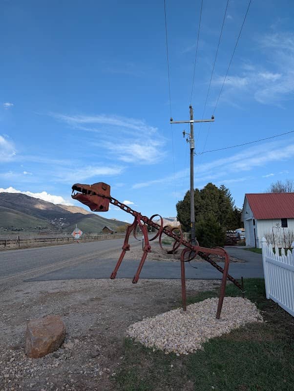 Rusty Dino Sculpture - Image 1