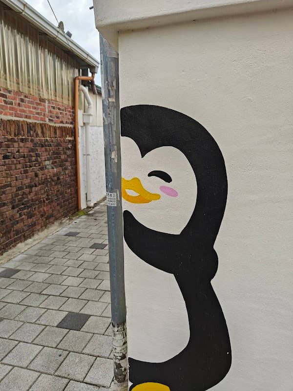 Tag Pingouins sur un banc - Image 1