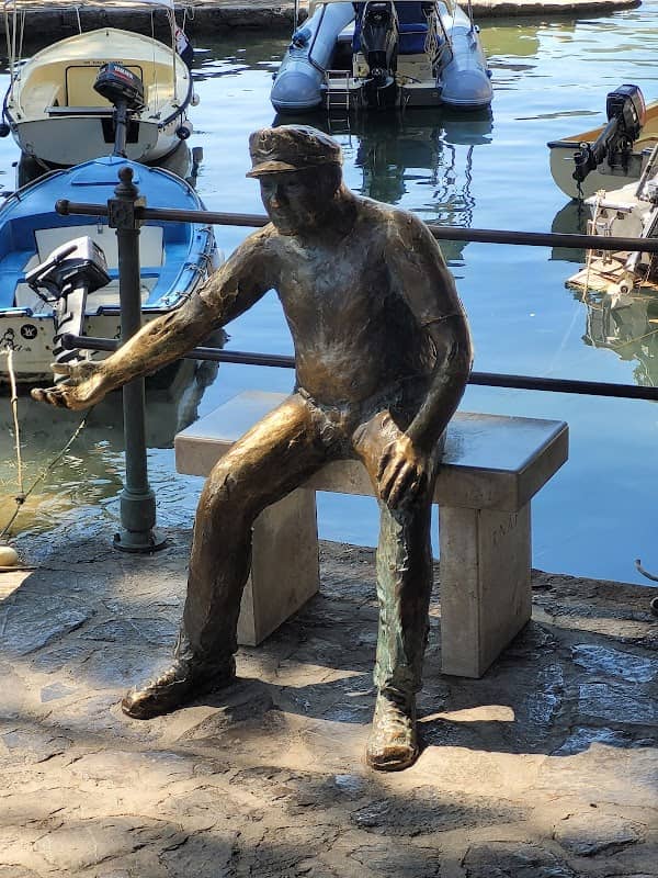 Bronze Fisherman Statue by Tatjana Kostanjević - Image 1