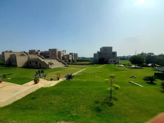 Green land along sector wall - Image 1