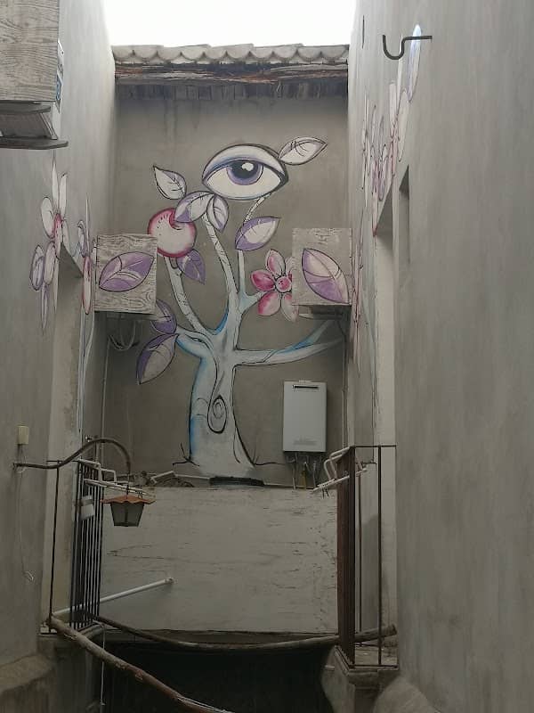 Noto street art - all seeing tree - Image 1