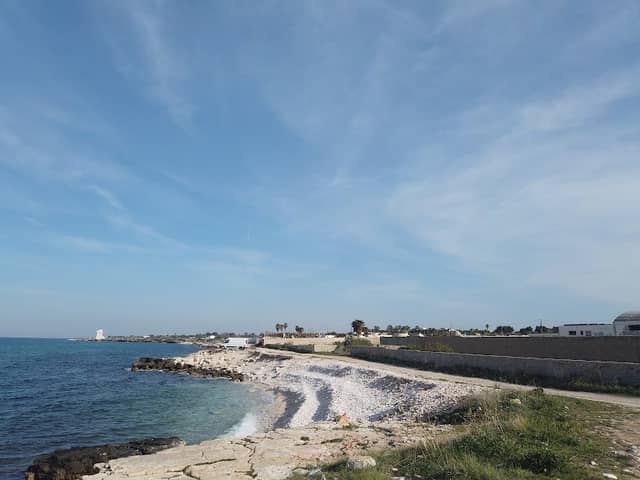 White Stone woman beach - Image 2