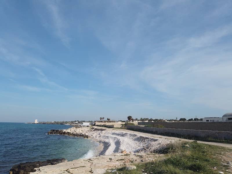 White Stone woman beach - Image 2