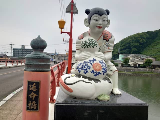 Imari Colored Painting and Catfish Statue of a Chinese Child - Image 1
