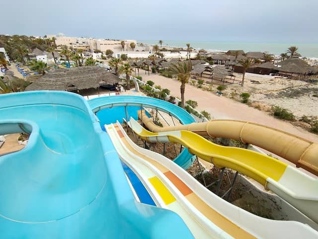 Fiesta Beach Club pools with waterslides - Image 1