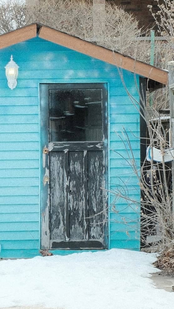 Weathered Blue Garden Shed - Image 1
