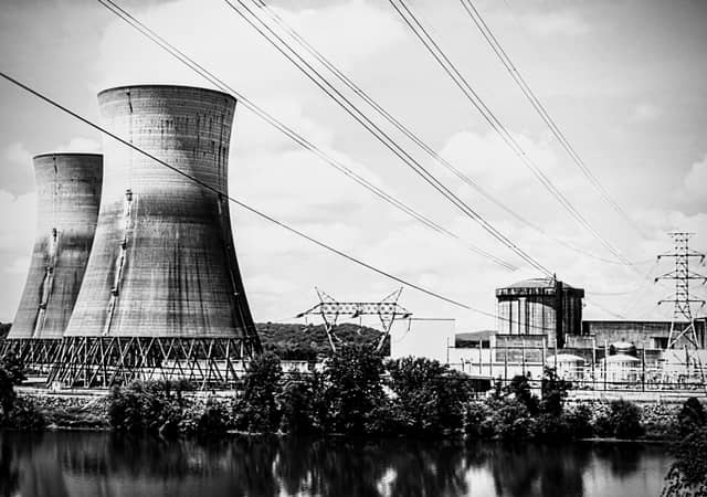 Industrial Cooling Towers Waterfront - Image 1