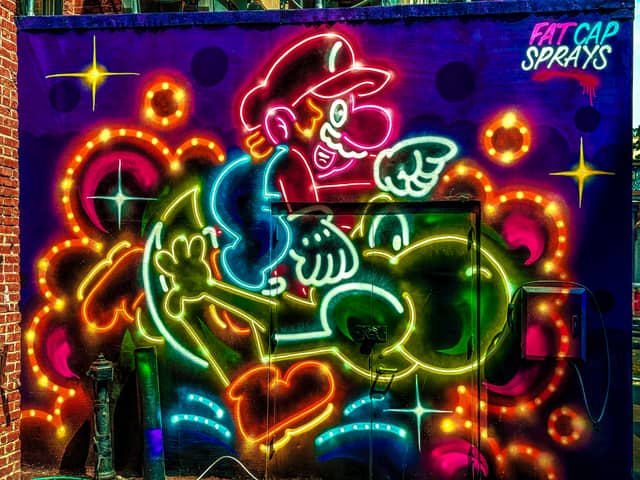 Mario and Yoshi Neon Mural by Fat Cap Sprays - Image 1