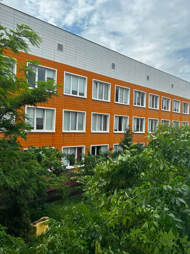 Orange Facade Modern Building - Image 1