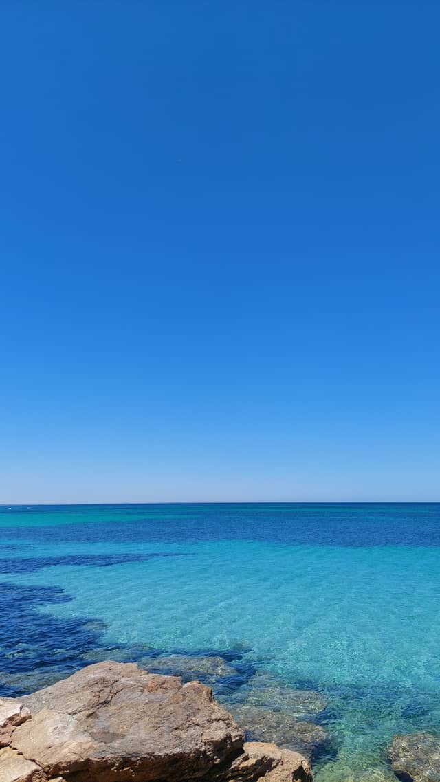 Turquoise Coastal Overlook - Image 1