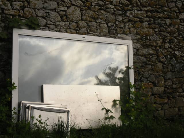 Rustic Stone Wall Reflections - Image 1
