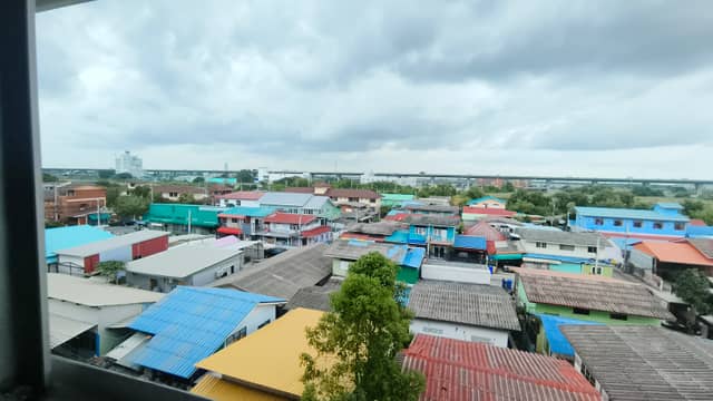 Colorful Rooftops of Samut Prakan - Image 1