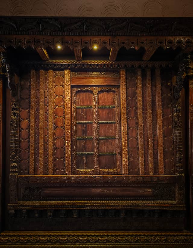 Traditional Wood Carvings at Cafe Haven - Image 1