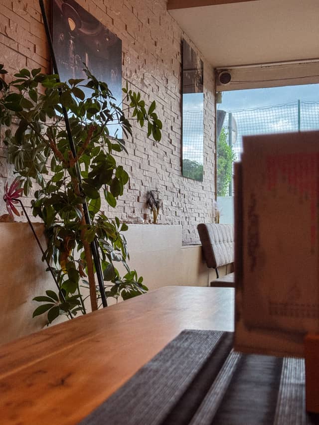 Cozy Cafe Interior in Linz - Image 1