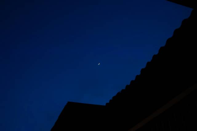 Crescent Moon over Soledad Rooftops - Image 1