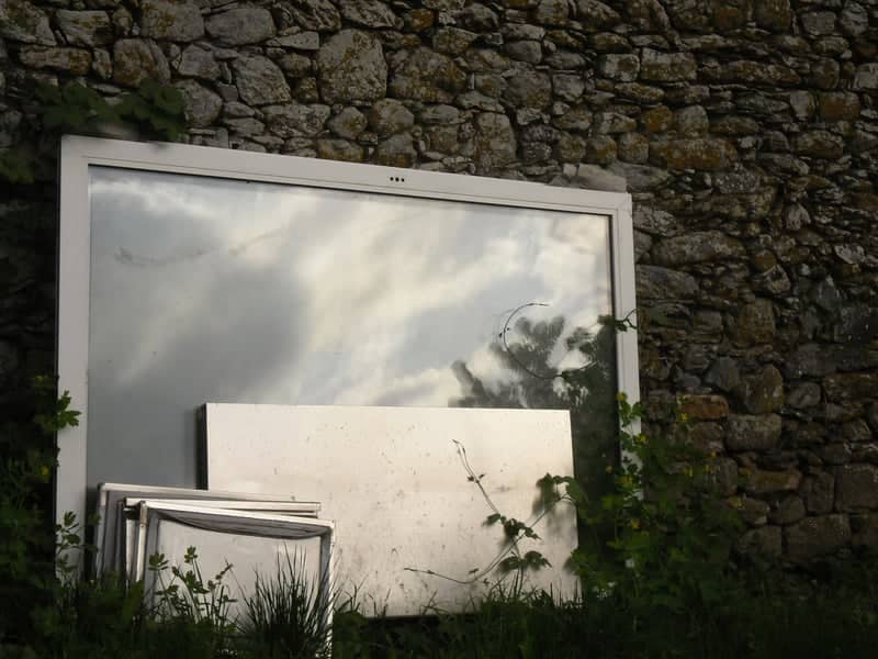 Rustic Stone Wall Reflections - Image 1