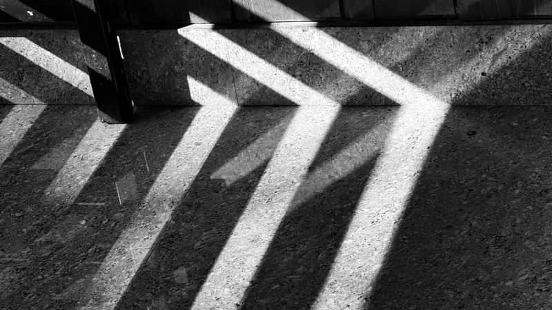 Geometric Shadows on Manarcadu Road - Image 1