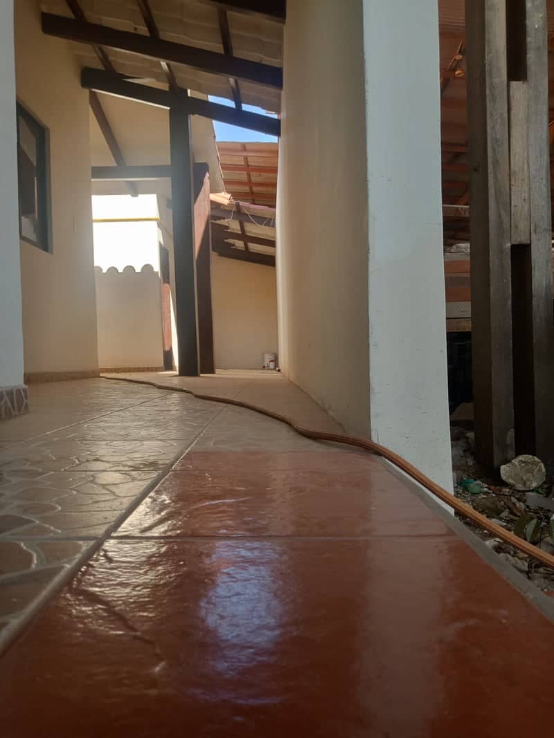 Rustic Tiled Corridor - Image 1