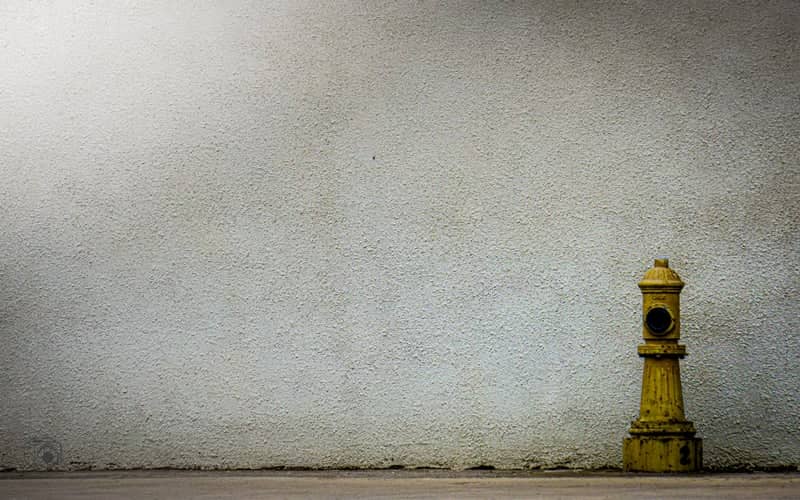 Minimalist Yellow Fire Hydrant Wall - Image 1