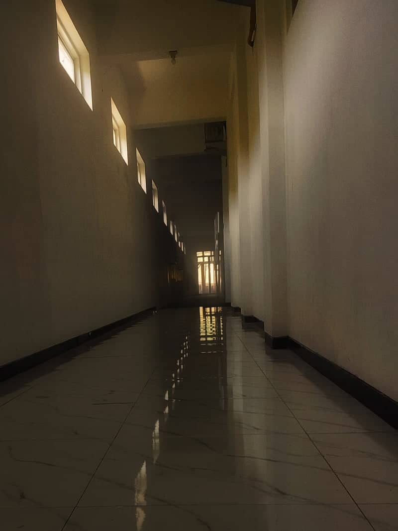Sunlit Hallway in Malang - Image 1