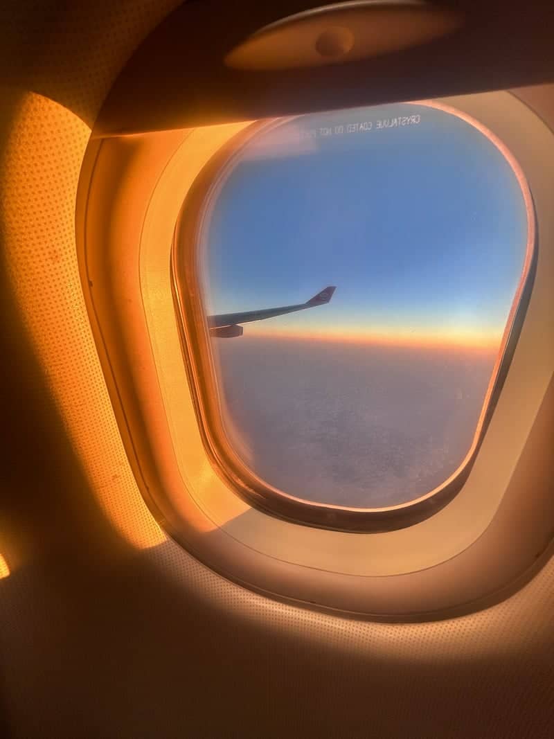 Aerial Sunset from Airplane Window - Image 1