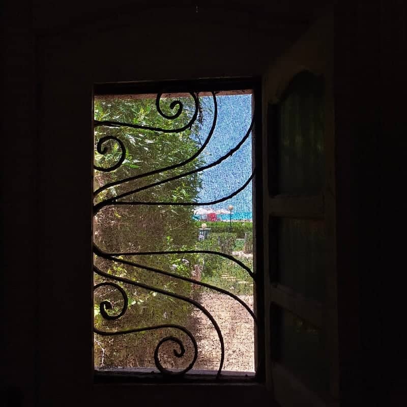 Mediterranean Garden Window View - Image 1