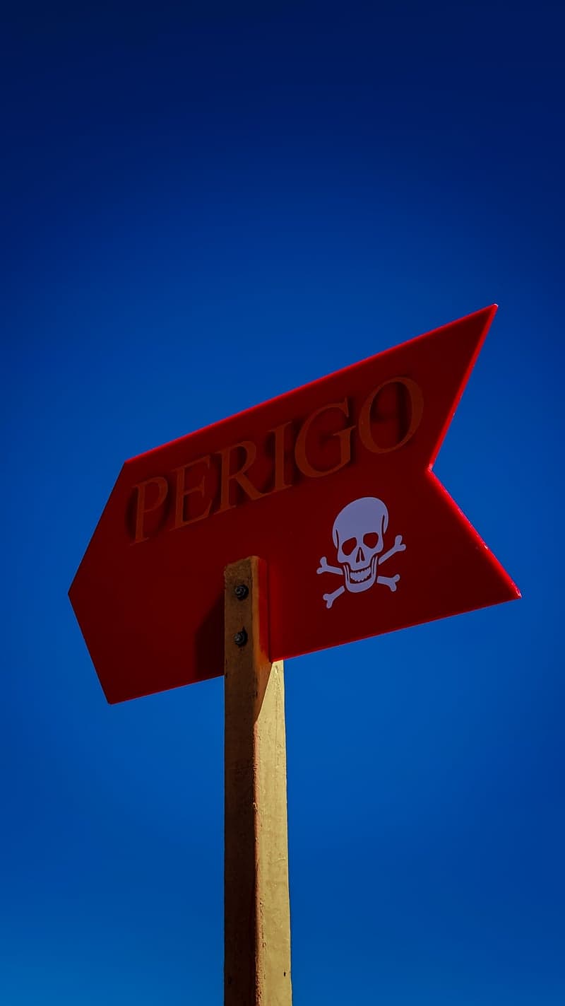 Enseada Beach Danger Sign