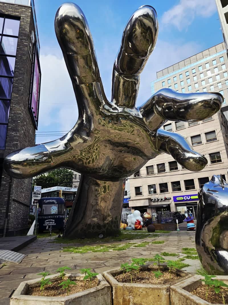 Giant Hand Sculpture at Gyeonghuigung-gil - Image 1