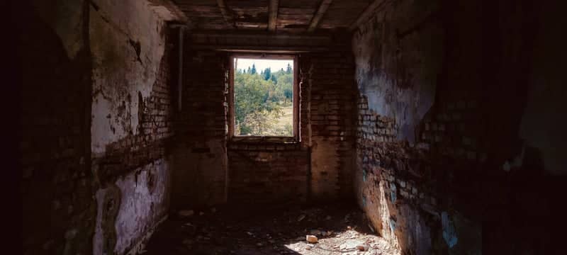 Abandoned Interior Overlooking Karlovy Vary Forest - Image 1