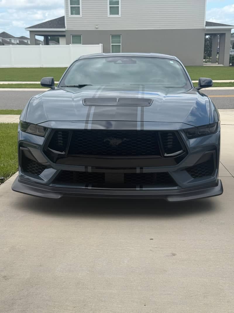 Suburban Driveway Automotive Spot - Image 1